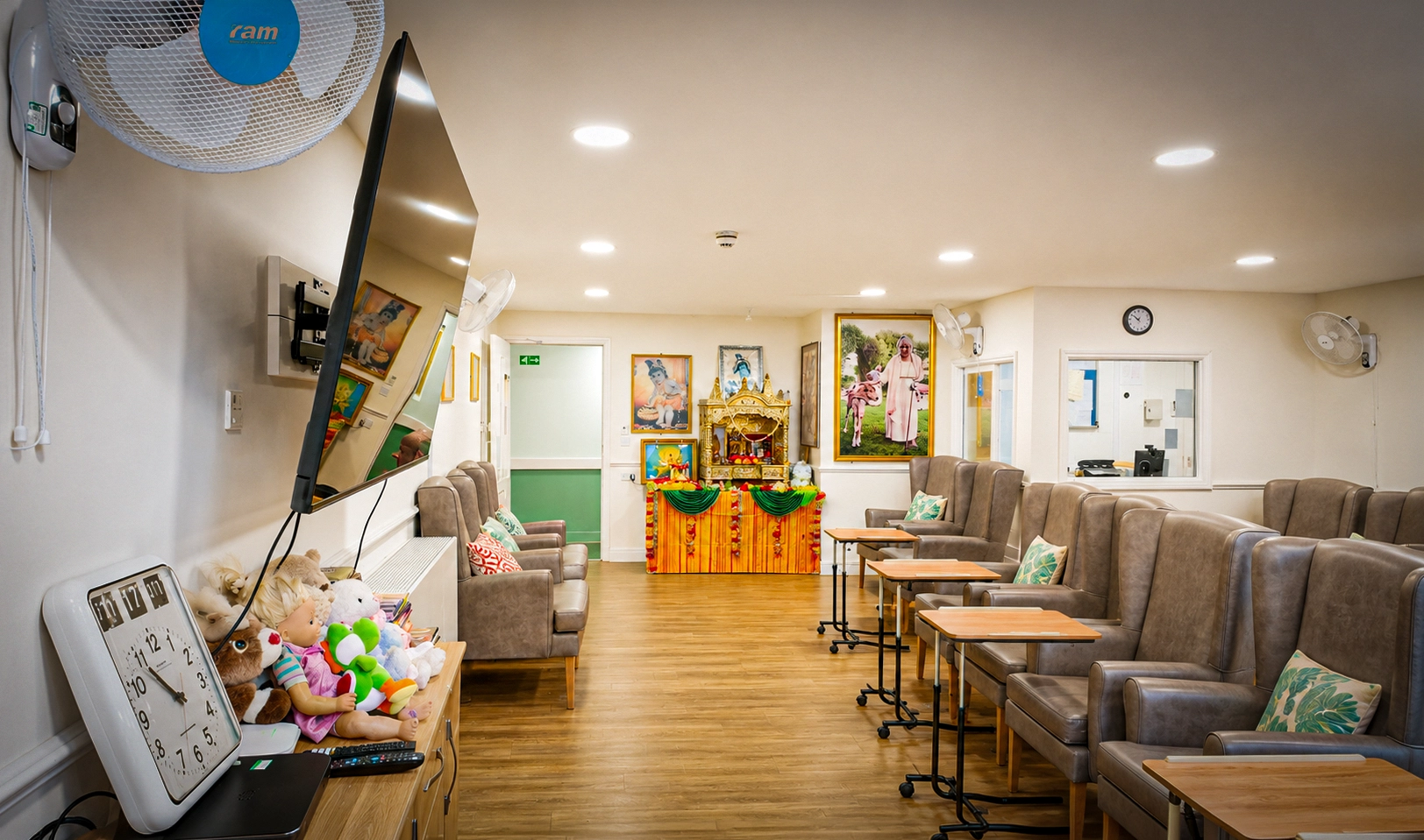 Residents relaxing in a warm, comfortable lounge during evening wind-down